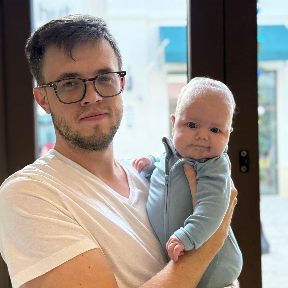 Michael Oskola with his son